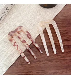 Lot de 2 épingles à cheveux en acétate motifs écaille et marbre ivoire