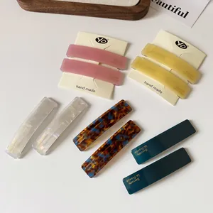 Elegant cellulose acetate hair barrettes in pastel and tortoiseshell colors for women