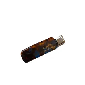Elegant tortoise shell acetate hair clip with gold Barrette La France lettering