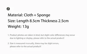 Detail showing material specs of floral hair tie made of fabric and sponge foam