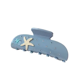 Blue starfish hair claw clip with starfish and rhinestones for elegant styling