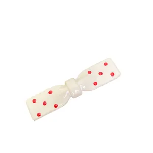 Barrette à cheveux nœud crème avec pois rouges en résine brillante pour filles