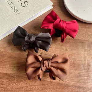 Classic satin bow hair claw clips set in red, black and coffee colors for women