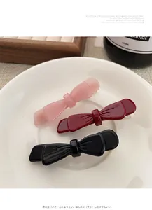 Set di 3 fermagli per capelli a fiocco in acetato rosa, bordeaux e nero su ceramica