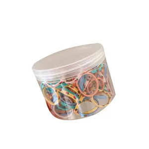 Colorful strawberry print elastic hair ties set for girls in a clear storage jar