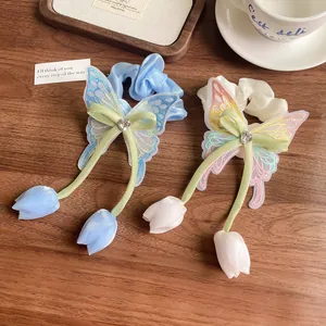 Chouchous exquis avec pendentifs papillon et tulipe pour filles en bleu et crème