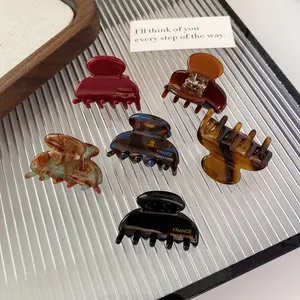 Set of 6 high-quality French acetate hair claws in assorted marble and tortoise patterns