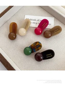 Detailed set of 6 acetate hair clips in various colors with France Handmade gold stamp