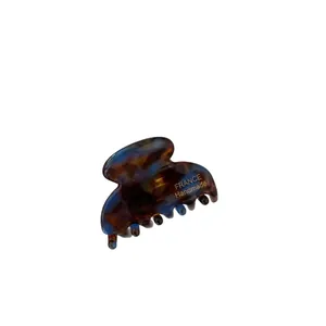 Small acetate hair claw with blue tortoiseshell pattern and gold France Handmade logo
