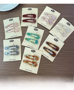 French vintage teardrop hair clips set in various colors and acetate marble textures