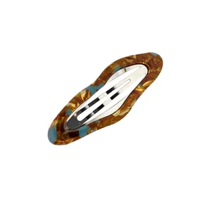 Cloud-shaped acetate BB hair clip with vintage tortoiseshell texture and metal base