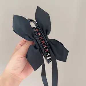 Barrette banane élégante avec nœud en satin noir et longs rubans pour queue de cheval