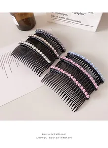 Set of six colorful faux pearl hair combs with rhinestones on a minimalist background