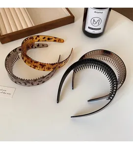 Set of four leopard print headbands with anti-slip teeth shown in a lifestyle scene