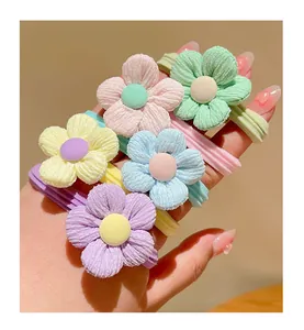 Set of five colorful macaron flower hair ties featuring corduroy texture for girls