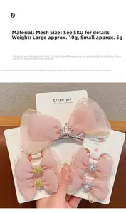 Detailed view of pink mesh bow hair clips with rhinestones on a white display card