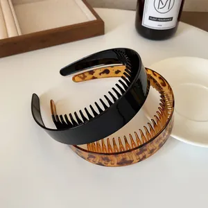 Leopard print and black non-slip headbands with teeth for volume and hair styling