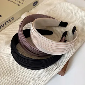Dreiteiliges strukturiertes Stoff-Haarreif-Set in Schwarz, Braun und Apricot