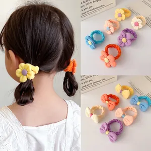 Elastic candy color hair ties for girls with flower and bow designs in vibrant shades