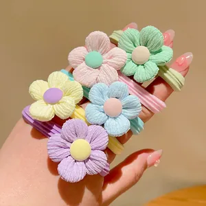 Five macaron flower hair ties in soft corduroy texture for girls hair styling