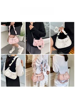 Street style view of beaded crossbody bags with pearl straps and ruched handles