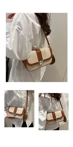 Close-up of retro saddle bag with woven fabric texture and brown leather trim details