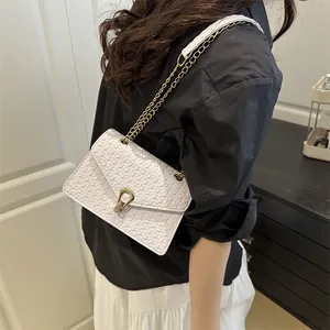 Elegant white woven PU leather shoulder bag with gold heart lock and chain strap
