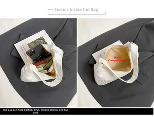 Detailed internal view showing large capacity for essentials in a white textured tote bag