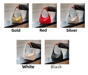 Detail view of woven checkered texture on hobo bags in gold, red, silver, white and black
