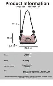 Pink bow underarm bag detail showing dimensions, black heart charm, and woven handle strap