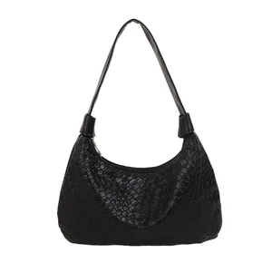 Large capacity black woven leather tote bag with stylish shoulder strap and metal zipper