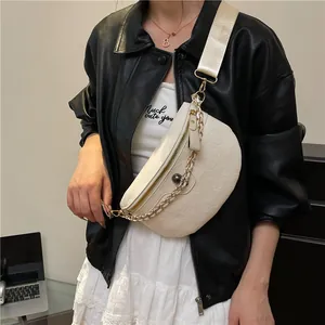 Chic beige PU leather crossbody chest bag with embossed patterns and wide nylon strap