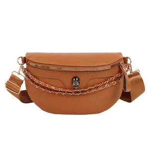 Caramel PU leather chest bag with skull embossing and metal chains for women