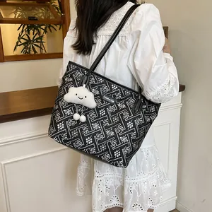 Ethnic pattern tote bag with flower prints and a cute cloud pendant on a shoulder strap