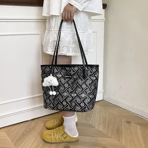 New Chinese style black tote bag with geometric patterns and a cloud plush charm