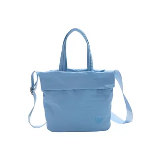 Light blue nylon tote bag with RAH TOP logo and adjustable strap for daily commute