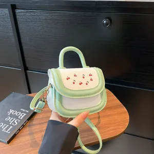 Mini mint green and white crossbody bag for girls with cute red cherry prints