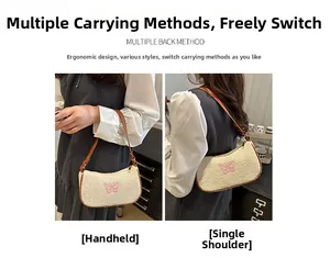 Stroh-Schultertasche mit zwei Tragevarianten: Handtaschen-Modus und Schultergurt-Modus