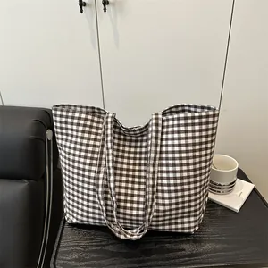 Large capacity canvas tote bag with classic brown and white gingham pattern for casual use