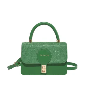 Bright green square crossbody bag with textured sequins and fashion gold letter logo
