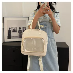 Detail view of the large transparent window on this versatile cream white ita backpack