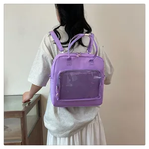 Detail of purple multi-way backpack showing transparent mesh pocket and durable straps