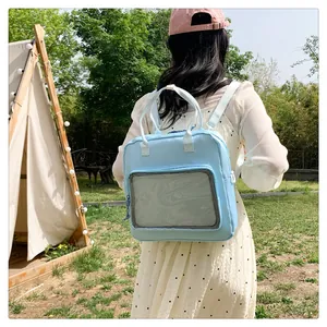 Detail of light blue versatile backpack with front mesh pocket in an outdoor camping setting