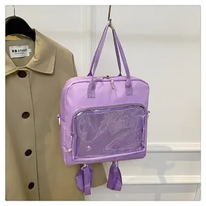Detailed view of purple versatile backpack with a large transparent display window