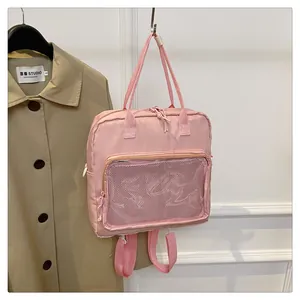 Pink multi-functional backpack with transparent mesh front pocket and top handles