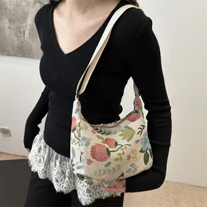 Vintage floral jacquard crescent shoulder bag with bohemian printed fabric finish