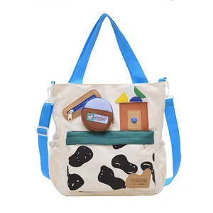 Mochila minimalista de lona con bolsillo de vaca y correas azules para estudiantes