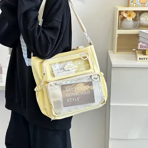 Japanese style light yellow crossbody ita bag with transparent PVC pockets and straps