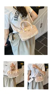 Detailansicht der beigen Handtasche mit Metallschleife, Spitze und abnehmbarem Gurt