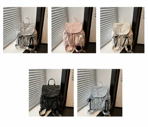 Detailed comparison of high-capacity casual backpacks in grey, pink, white, black and blue